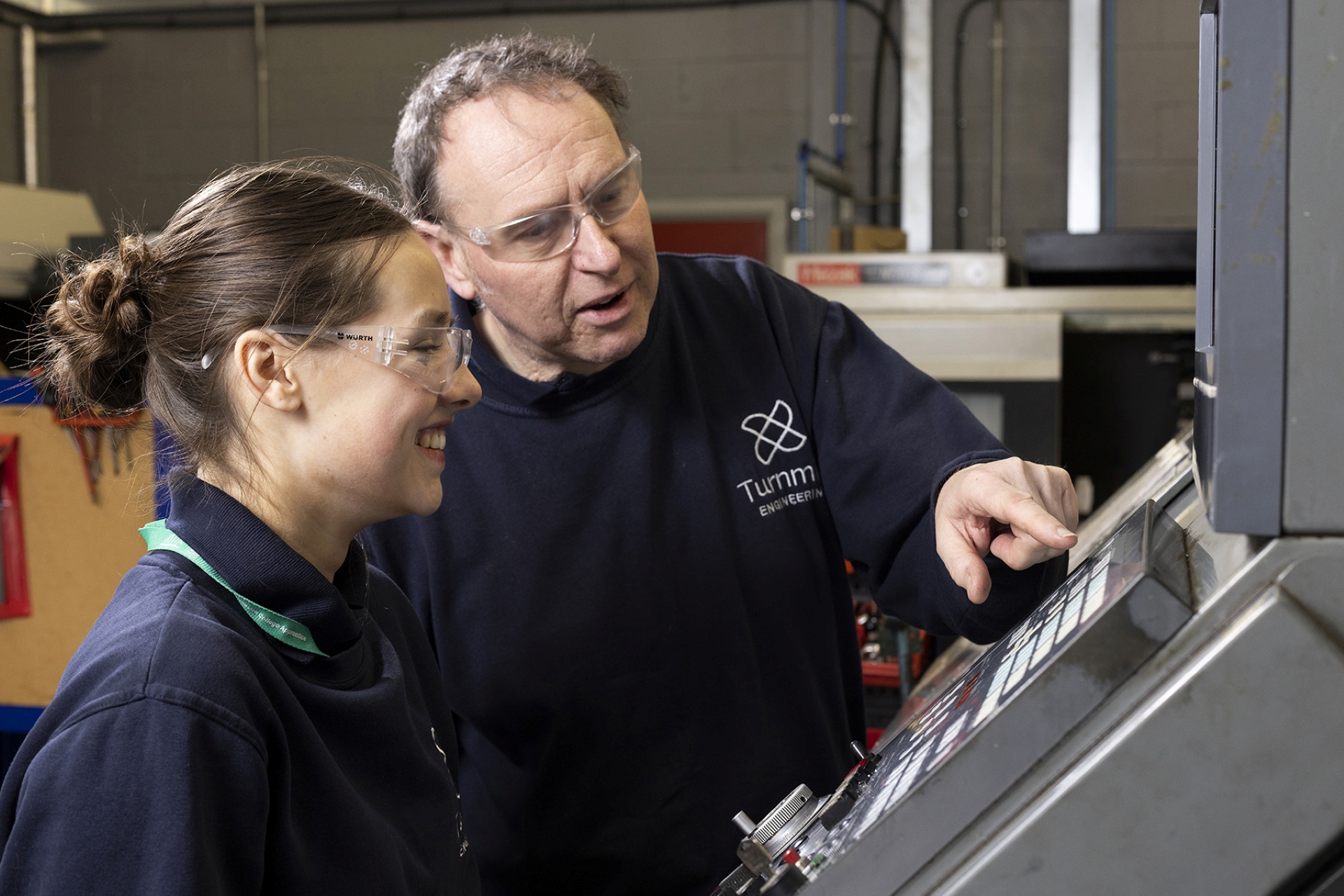Apprentices - Engineering apprentice on site with employer - at machine