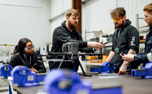 Energy Academy - HE Tutor and Students with Drone